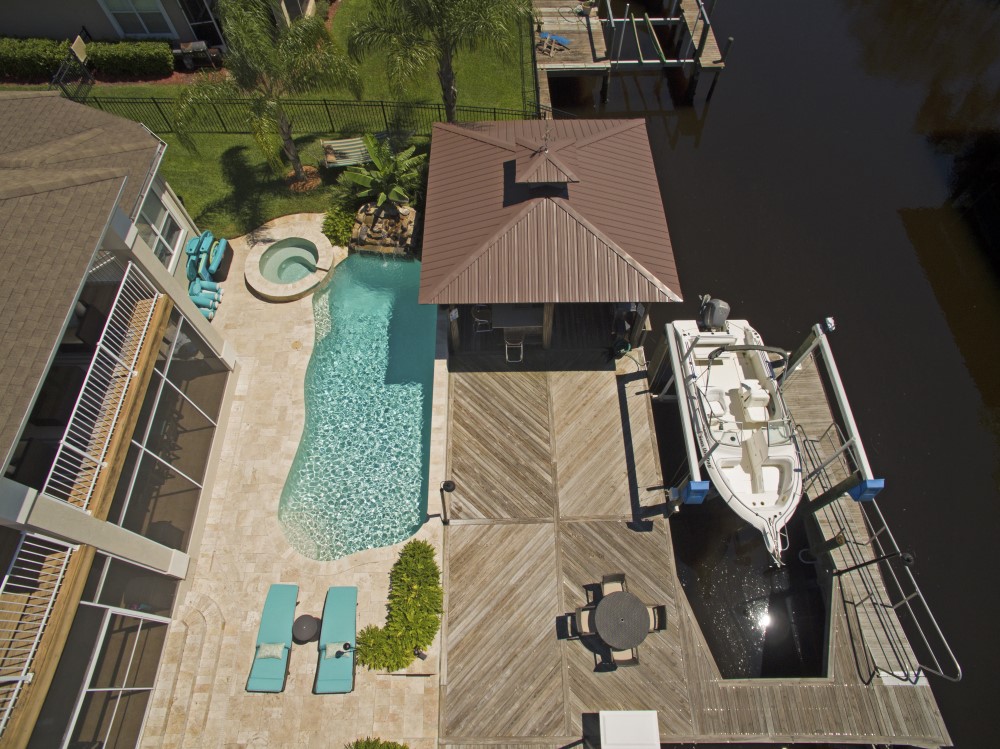 Newly remodeled residential pool with fresh tiling and replastering