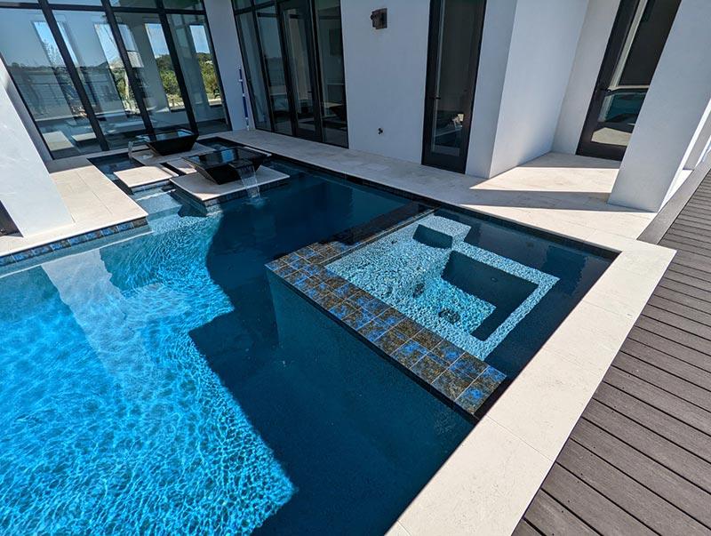 Coastal luxury outdoor living space with pool in Jacksonville, FL
