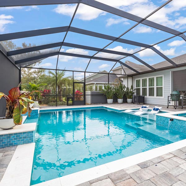 beautiful backyard pool in lanai