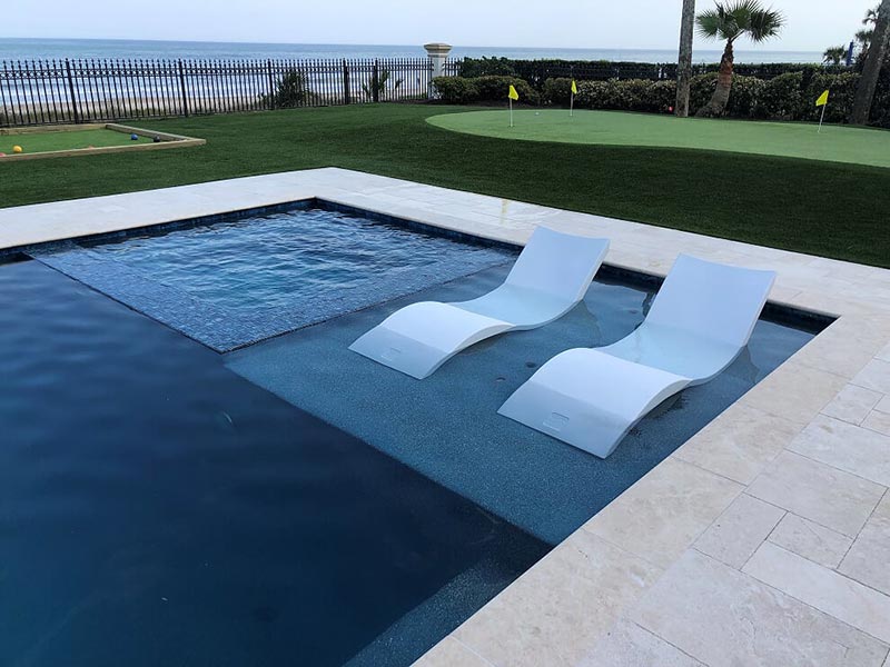 ledge loungers in pool