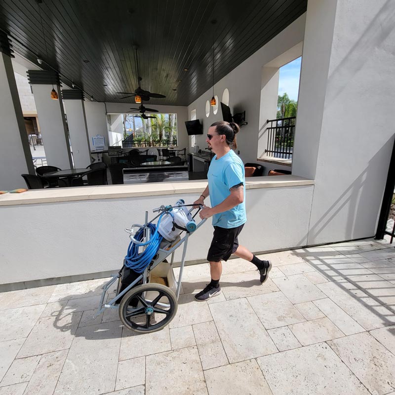 man with pool equipment
