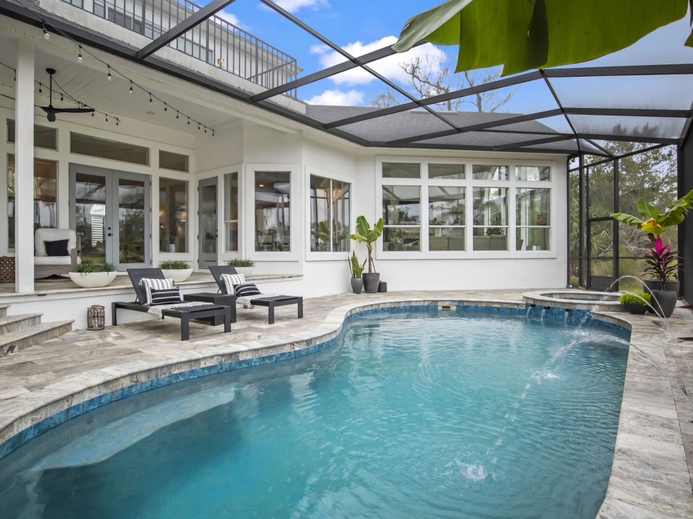 Newly remodeled residential pool with fresh tiling and replastering