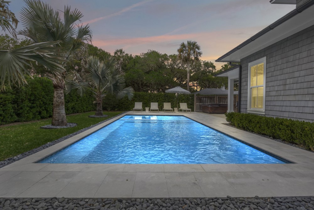 Pool grey house at nighttime