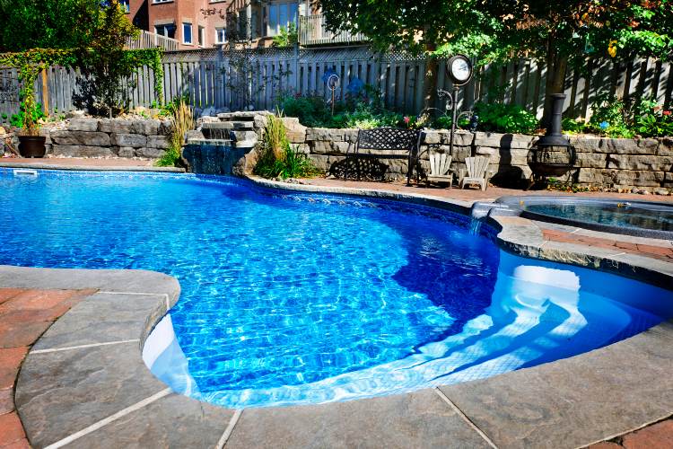 Residential pool remodel with updated features and design