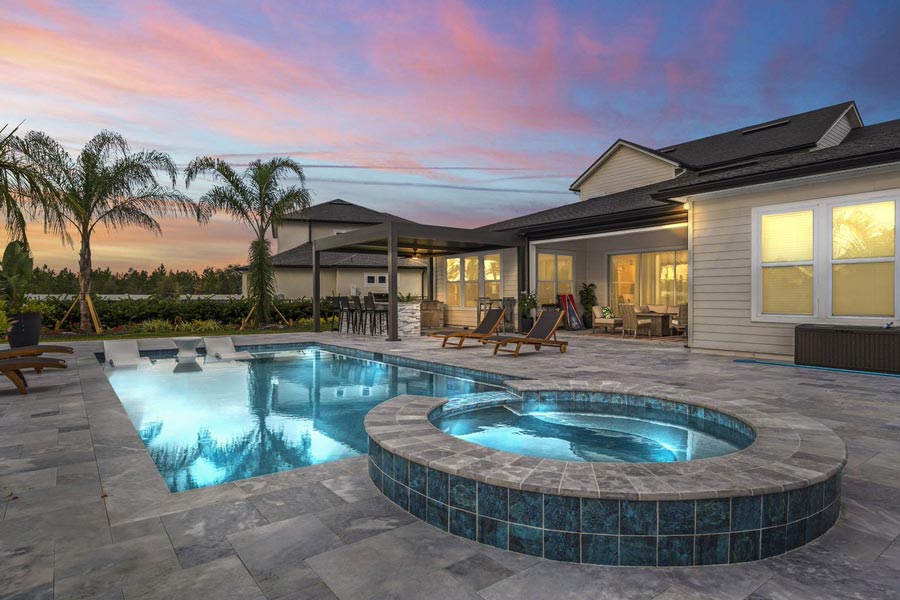 Custom-built residential pool showcasing 3D design with a spa