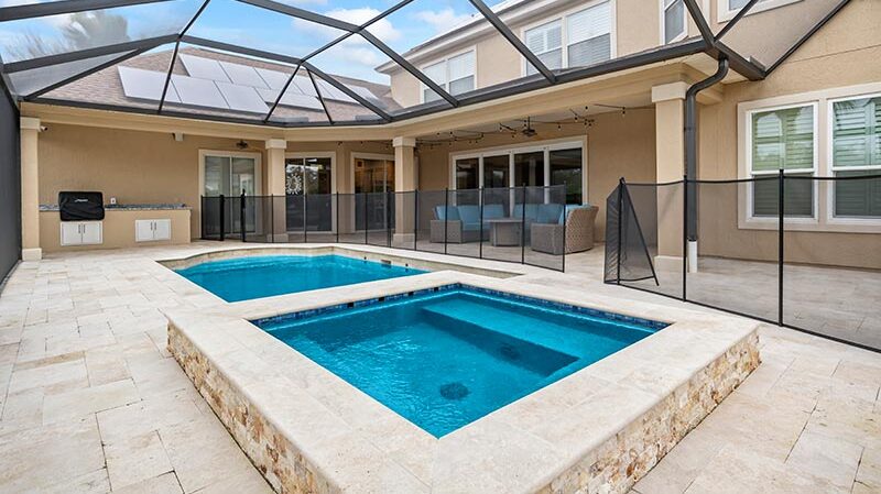 Glistening pool in Jacksonville, FL, by Coastal Luxury Outdoors.