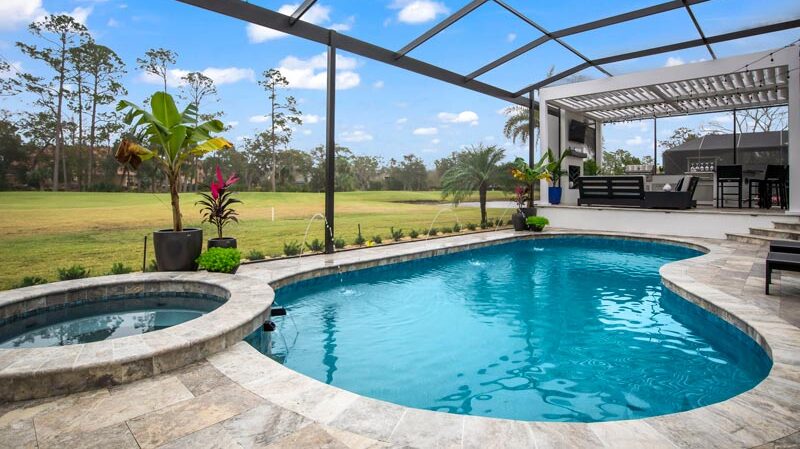 Stunning pool view at sunset with Coastal Luxury Outdoors in Jacksonville, FL.