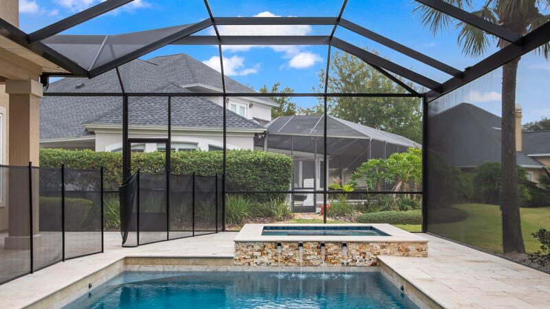 Luxurious backyard pool by Coastal Luxury Outdoors in Jacksonville, FL.